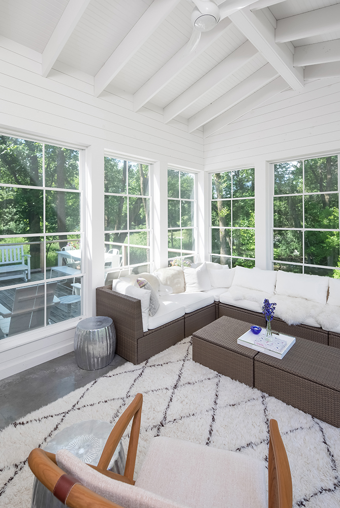 Three-season porch for this Mendota Heights home built by AMEK enhances the connection to nature.