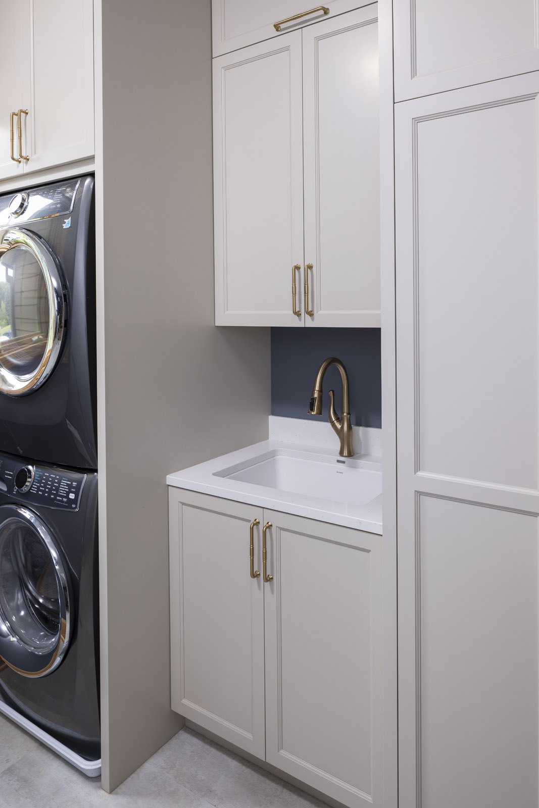 AMEK Inver Grove Heights mudroom and laundry room. Better use of space and custom cabinetry helps serve the family.