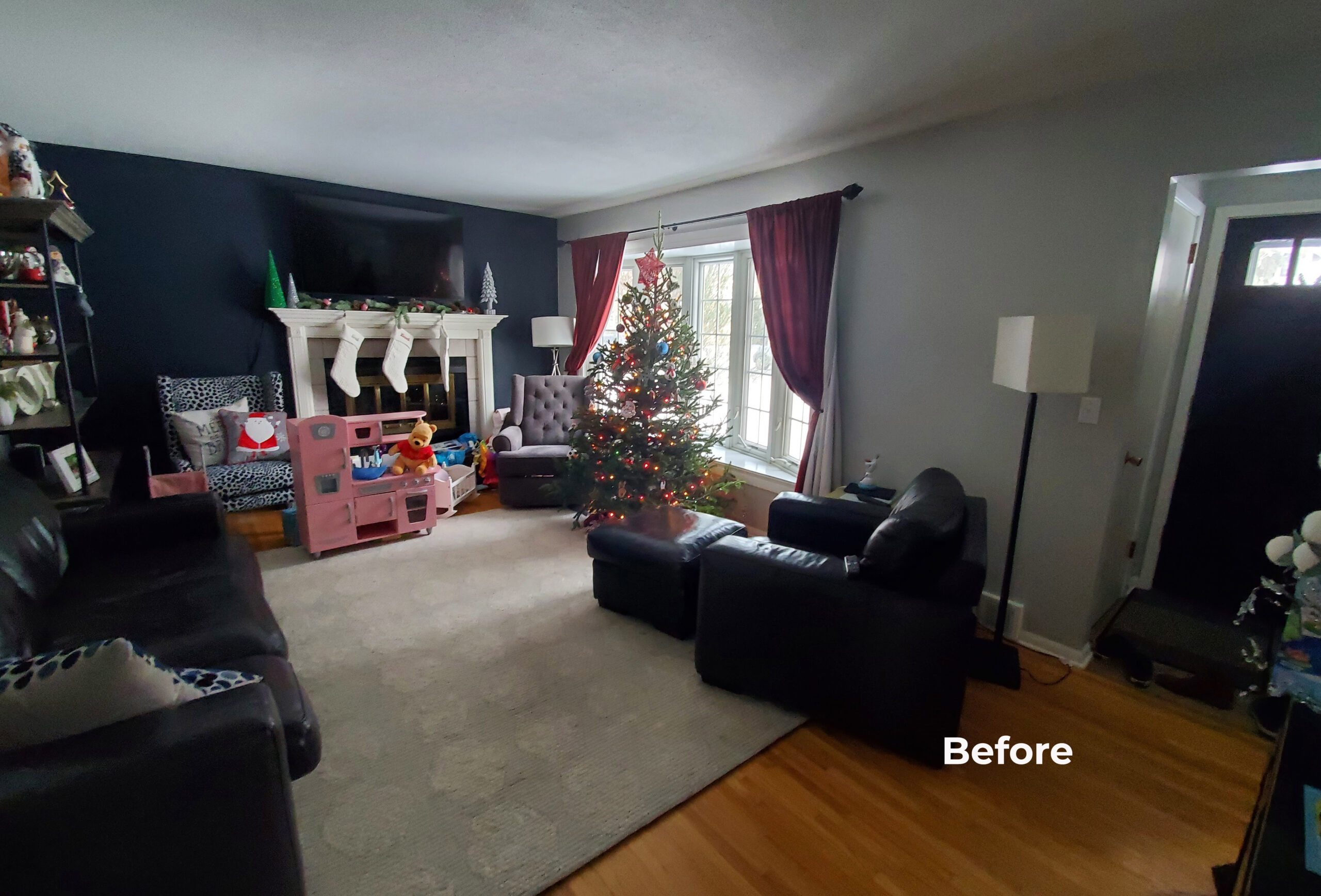 Raising A Family & The Roof 1 AMEK Minneapolis Main Add Before 2021 Living Room Before Wording scaled 2