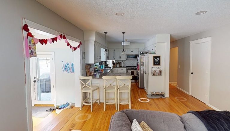 AMEK RS Fall 2023 Eden Prairie Before Living Room KItchen 768x439 1