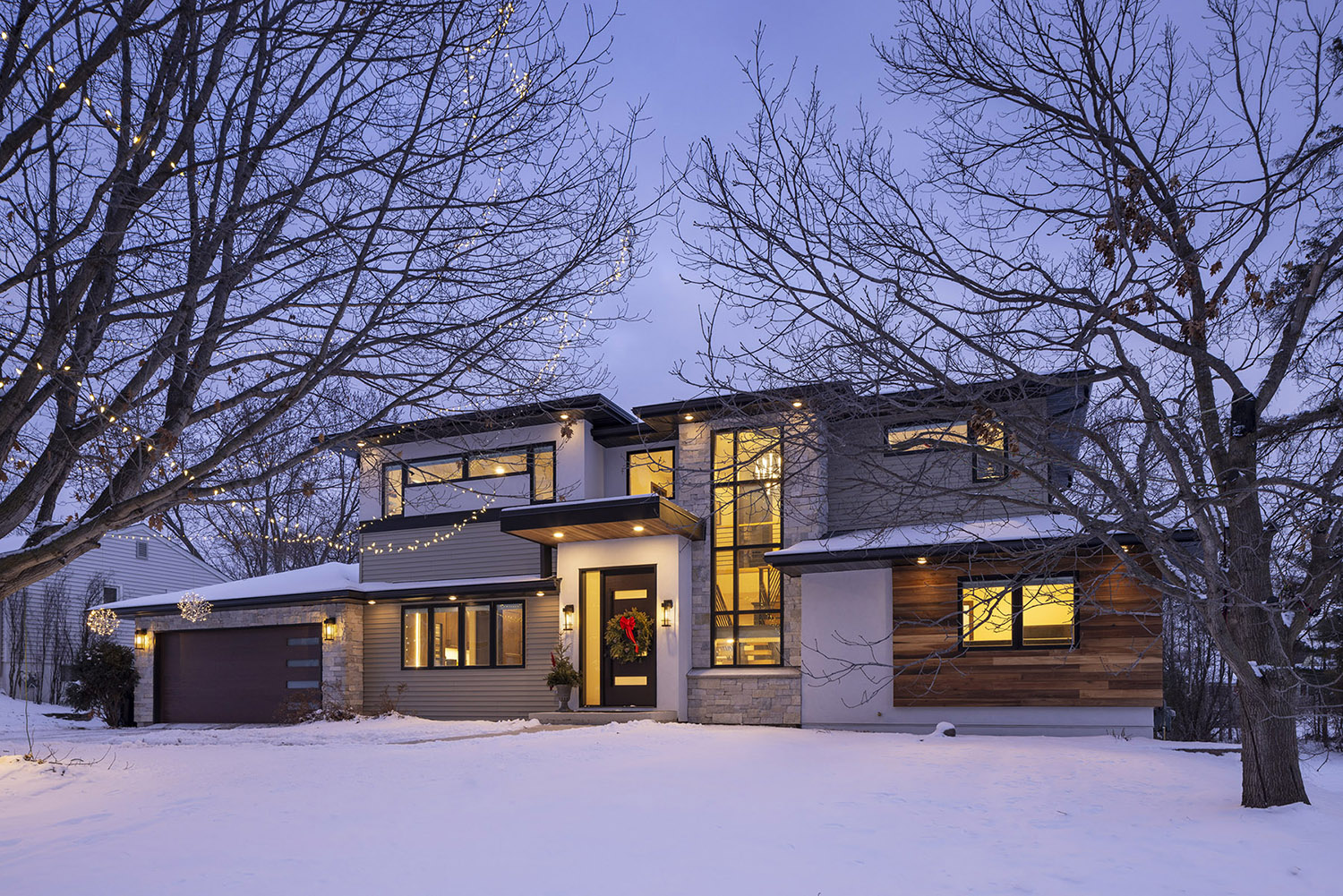 Remodeled split level home exterior in the Twin Cities metro by AMEK Design + Build